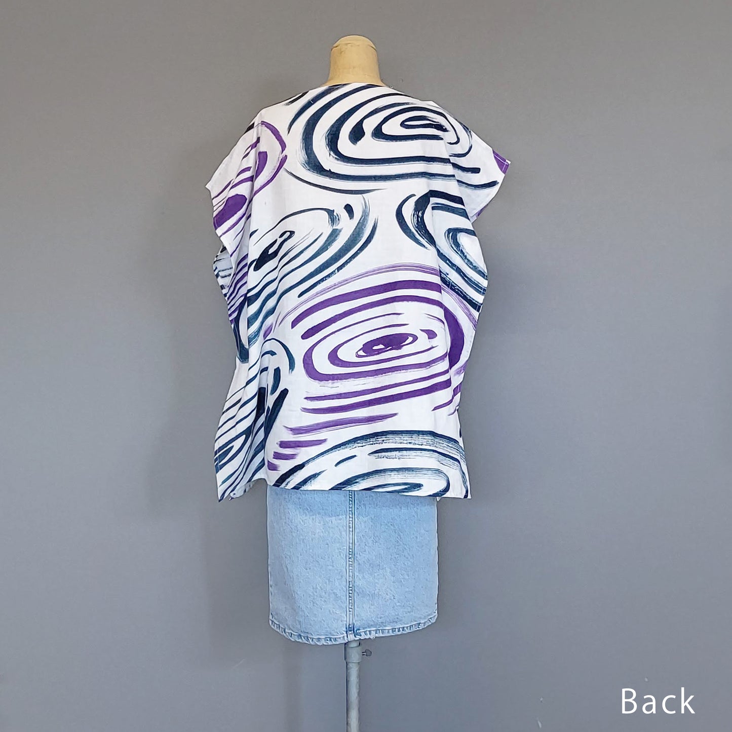 Rain drops falling into a pond