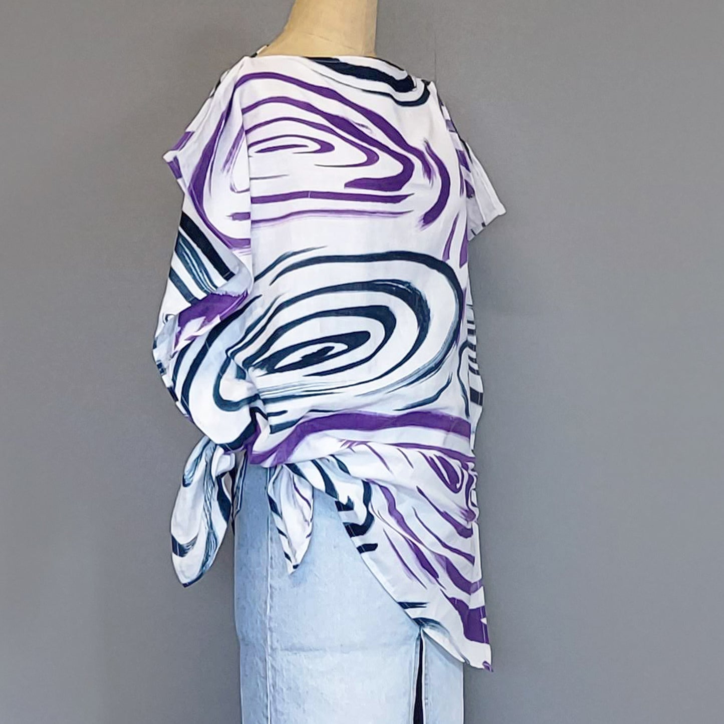 Rain drops falling into a pond