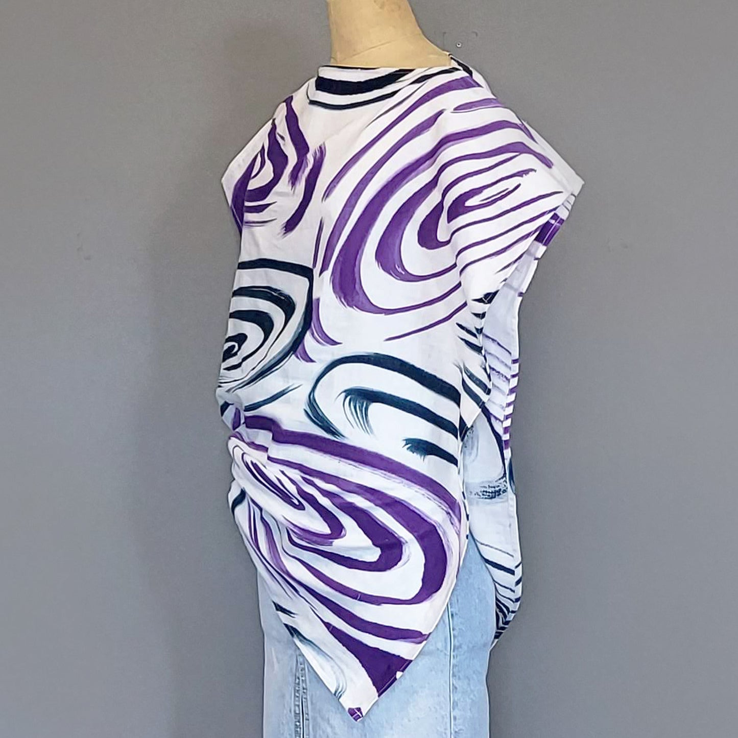 Rain drops falling into a pond